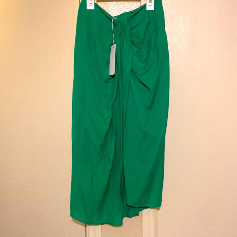 Kelly green is the color for the season. NWT long skirt.